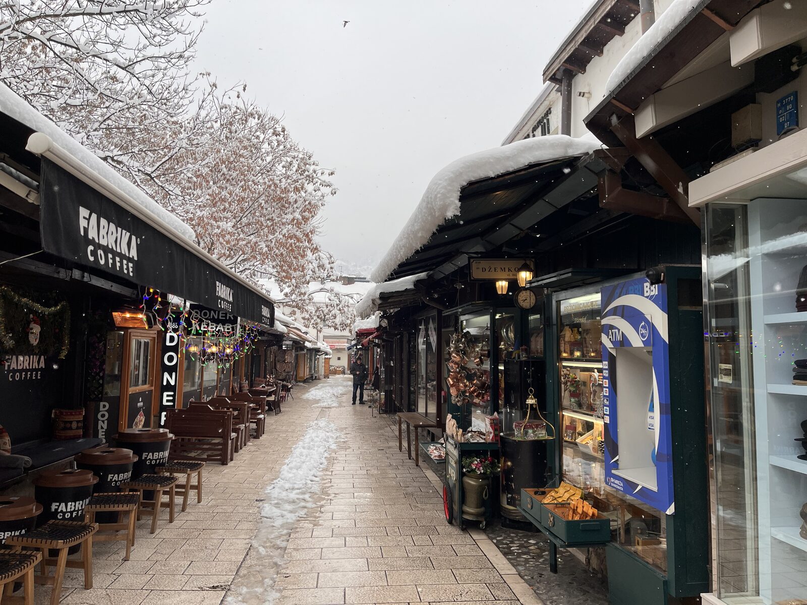 Sarači street running west from the Sebilj toward the Gazi Husrev-beg Mosque, photographed in winter.