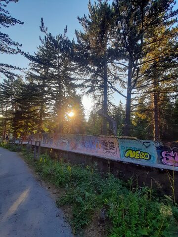 A structural section of the Sarajevo bobsled track showing the concrete sleepers and bracing beneath the chute.
