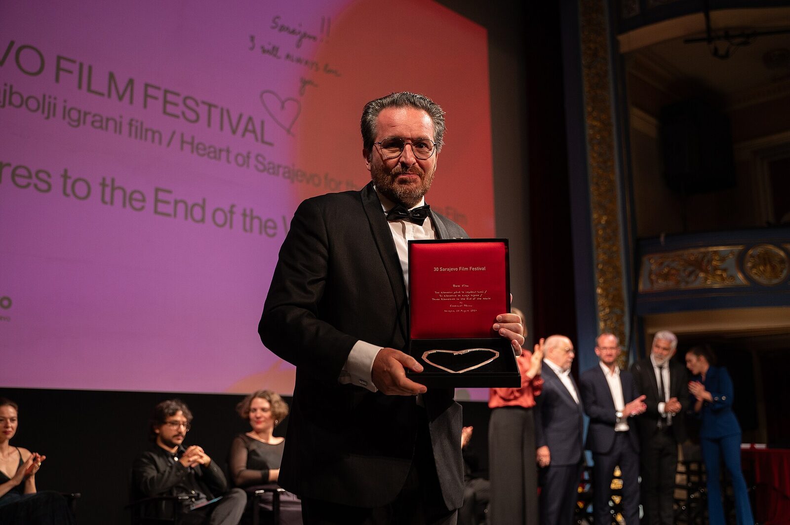 The Heart of Sarajevo award laid out with the other prizes at the closing of the 30th Sarajevo Film Festival, 2024.