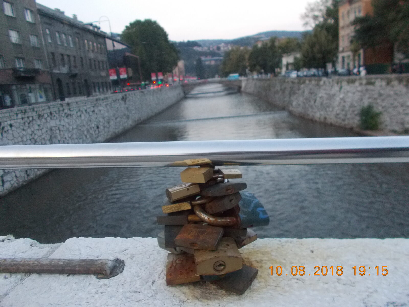 Padlocks left by visitors on the railings of the Latin Bridge — the modern love-locks tradition.