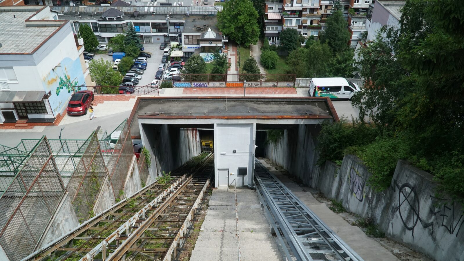 The Ciglane funicular staircase running up the hillside through the terraced concrete housing blocks of Ciglane, Sarajevo.