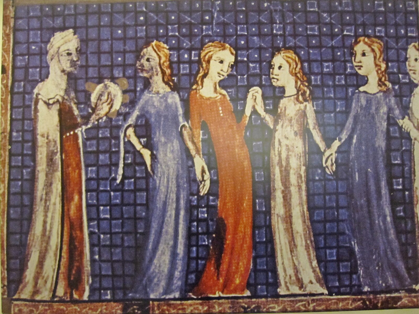 An illustration from the Sarajevo Haggadah showing Miriam holding a timbrel in her raised hand, surrounded by women dancing — the scene of Miriam leading the song of celebration after the crossing of the Red Sea, from Exodus 15:20.